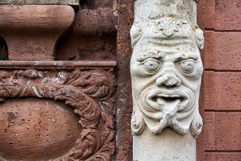 Stone figure at the entrance gate, Abbey Castle Corvey in Hoexter, Weserbergland, North Rhine