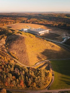 Landscape with factory on a hill in autumnal surroundings, Gechingen, Black Forest, Germany