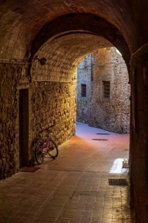Tunnel in an alley in San Gimignano, Tuscany, Province of Siena, Italy