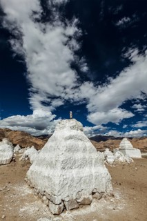 Whitewashed chortens (Tibetan Buddhist stupas) . Nubra valley, Ladakh, India