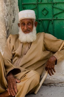 Nizwa, Oman. May 29th 2014 Portrait of an old Omani man in a small village near Nizwa, Oman