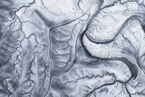 A captivating aerial shot of the unique and intricate natural patterns at Moonscape Overlook in