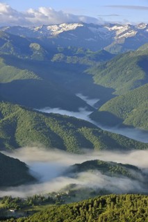 Mist in the valleys at sunrise, seen from the Col de Portel, Pyrenees, France