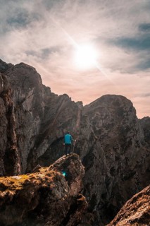 A hiker at the top of the mountain of Aiako Harria or Peñas de Aya in the town of Oiartzun,