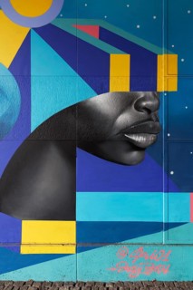 Realistic face with VR glasses made of geometric shapes, 3D portrait, mural by street artist SKIO,