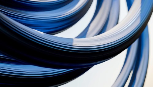 This image features a captivating 3D render of a dynamic attractor with swirling blue and white