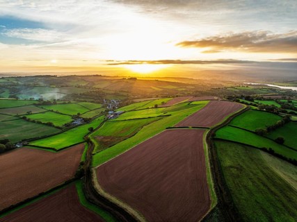Colours of autumn Fields and Farms over Sheldon from a drone, Torbay, Devon, England, United