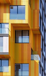The vibrant and modern architecture in the suburbs, showcasing a mix of glass, concrete, and metal