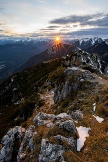 Mountain panorama, mountain landscape with sun star at sunset, at the summit of the Kramerspitz, in