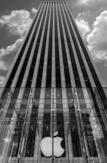 Apple logo in front of a skyscraper in Central Park, New York City, USA