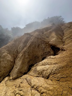 Clouds of fog, yellow earth, erosion, near Arguamul, La Gomera, Canary Islands, Spain