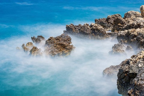 Romantic view over the sea in Koromacna Bay on a sunny day with rough seas on the island of Cres,