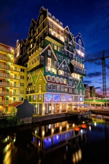 ZAANDAM, NETHERLANDS, MAY 21, 2018: Inntel Hotel in Zaandam illuminated at night. Design of