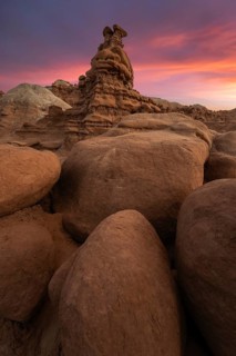 Majestic sandstone formations in Goblin Valley State Park, Utah, USA, displayed under a stunning