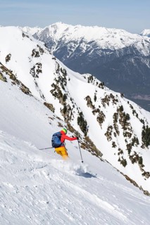 Ski tourers on the descent, peaks and mountains in winter, Sellraintal, Kühtai, Tyrol, Austria
