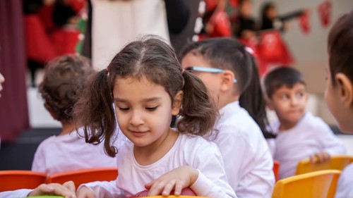 Children celebrate the 102nd anniversary of the Republic Day of Turkey, a national holiday
