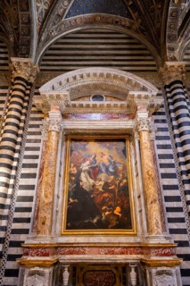 Interior of colorful marble decoration, Siena Cathedral or Cattedrale di Santa Maria Assunta,