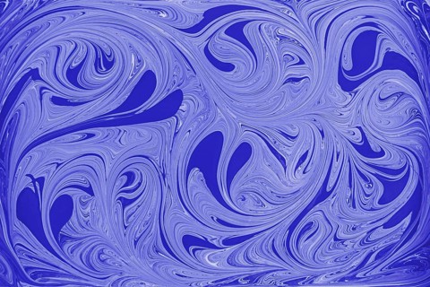 This image showcases an abstract floral pattern of swirling blue and white acrylic paint,