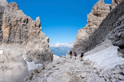 Three mountaineers in the mountains, Via Ferrate Benini Via Ferrate, Brenta Mountains,