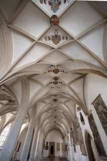 Vault with coat of arms in the late Gothic mortuary, burial place of the cathedral canons,