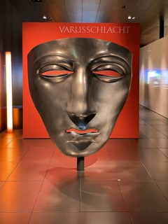 Oversized exhibit in Varusschlacht Museum replica of mask face mask of Roman legionary cavalry