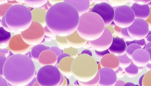 A mesmerizing view of abstract pastel spheres in lavender, cream, and pink hues. Floating