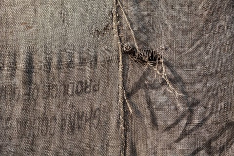 Torwache wrapped with old jute sacks, Check Point Sekondi Loco, by artist Ibrahim Mahama, documenta