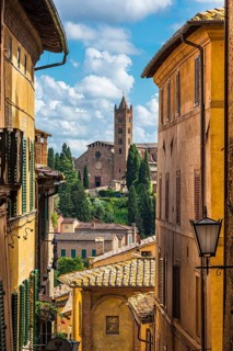 Old town with view of Basilica di San Clemente, historical, building, alley, Siena, Tuscany, Italy