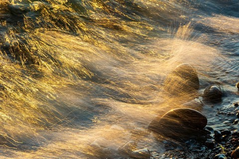 Wave play at sunrise on the chalk coast in Jasmund National Park, Rügen, Sassnitz,