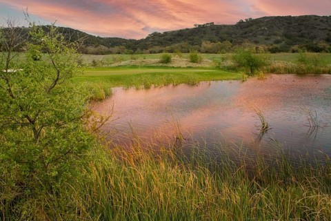 Scenic Golf Course Fairway and Green with Pond