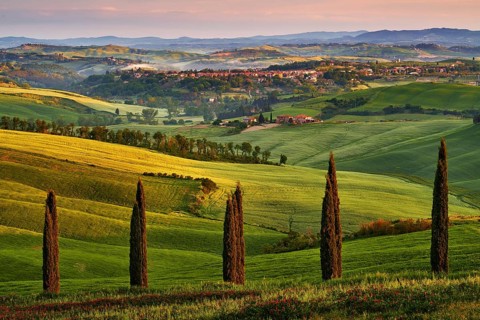 Asciano, landscape in Tuscany, near the Siana and Pienza, Sunrise morning in Italy. Idyllic view on