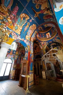 Colourful frescoes of Christ on the ceiling and walls of a 200-year-old church in Lagia, Mani,