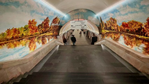 Subway tunnel with murals of trees and water in autumn style, warm atmosphere, Yerevan, Armenia