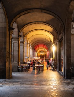 Restaurants in the arcades at Plaça Reial in Barcelona, Spain