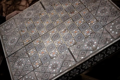 Damascus, Syria. December 10th 2025. Close-up detail of a handmade mosaic wooden backgammon box