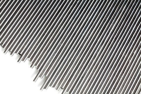 A stack of round bundled aluminium rods, Ein Bündel mit Stäben aus Aluminium