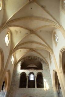 Interior of Saint-Sebastien Church in Manglieu, featuring Romanesque arches, Puy de dome