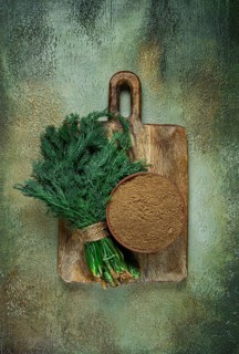 Dried dill, in a ceramic bowl, a bunch of fresh dill, seasoning, top view, no people