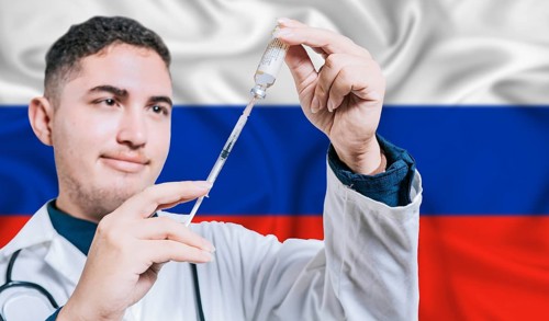 Doctor holding syringe on Russia flag background. Medical professional holding syringe with Russian