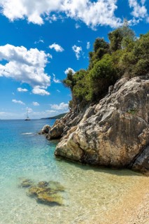 Beautiful beach in summer of Paralia Mikros Gialos in the south of the island of Lefkada. Greece