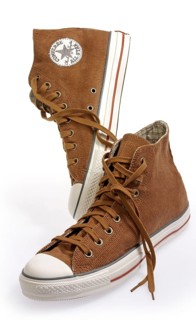 1 pair of shoes, sports shoes, Converse All Stars, in front of a white background, studio shot
