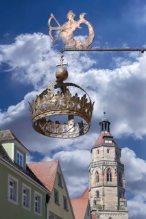 Nose sign of the Hotel Restaurant Krone, 15th century, Rosenstraße 10, behind the tower of the