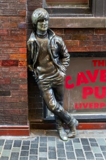 Statue sculpture of John Lennon of the Beatles, Mathew Street, Liverpool, Merseyside, England, UK