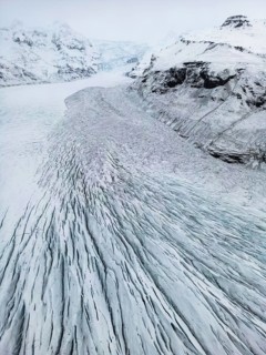 Aerial view of the stunning Icelandic winter landscape, showcasing remote, wild nature with