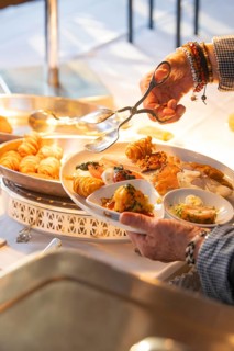 A fine buffet in the restaurant is lovingly presented under a lamp, Europäischer Hof, Königsbach
