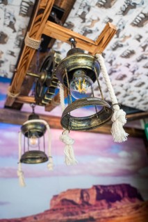 Decorative old lamps on a wooden ceiling