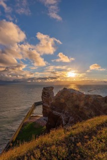 Red red sandstone cliff edge, Heligoland high sea island, Lange Anna, backlight, North Sea, blue