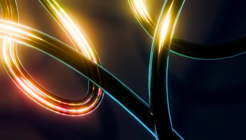 Abstract image 3D of glowing, intertwined light trails in vibrant shades on a dark background.