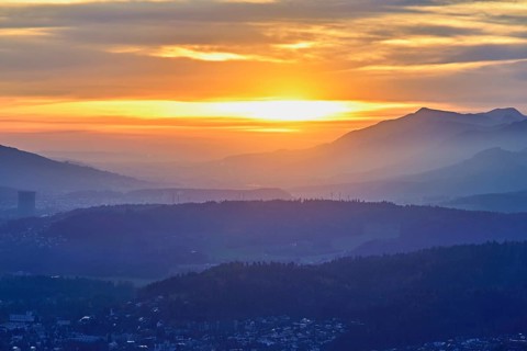 View of the Jura foothills from the Gisliflue, in the light of the setting sun, Talheim, Canton,