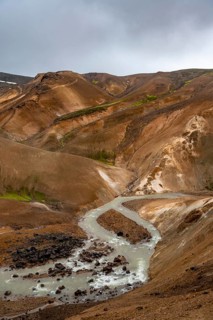 Steaming streams between colourful rhyolite mountains, Hveradalir geothermal area, Kerlingarfjöll,